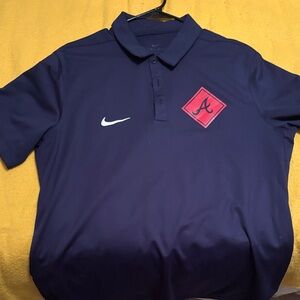 Nike Dark Blue Polo with Red Emblem